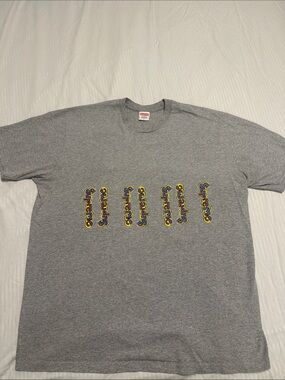 Supreme Grey Tee with Yellow & Purple Repeated Logo